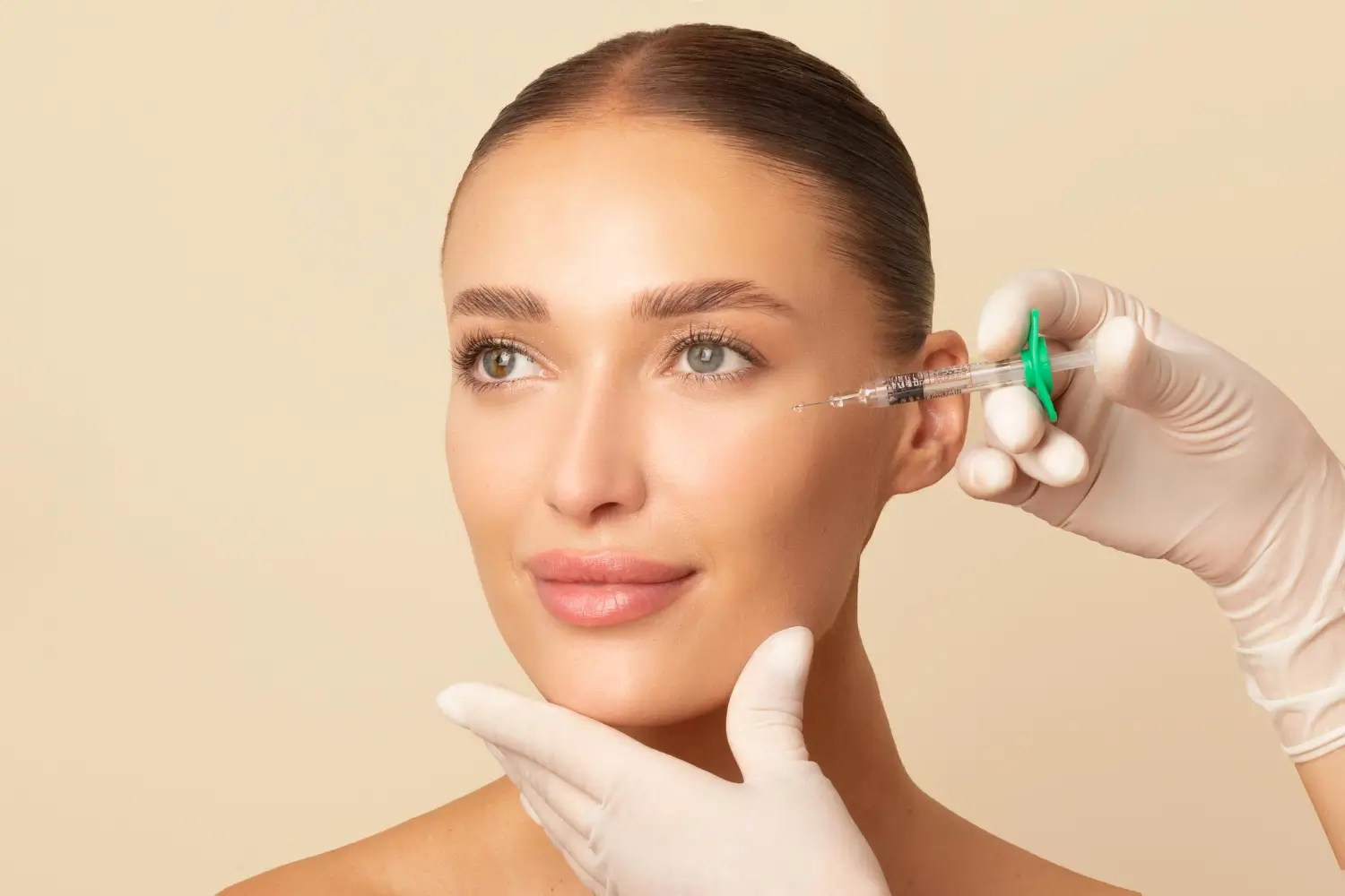 Woman receiving Rejuran face and eye treatment