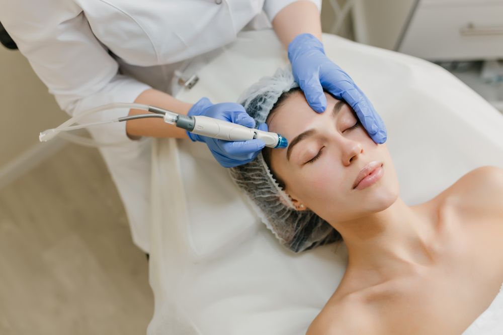 view-from-rejuvenation-beautiful-woman-enjoying-cosmetology-procedures-beauty-salon-dermatology-hands-blue-glows-healthcare-therapy-micro-needling